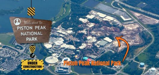 An aerial view of a construction site at Walt Disney World with a superimposed sign that reads "Welcome to Piston Peak National Park" and "Under Construction," featuring an arrow pointing to the work area.
