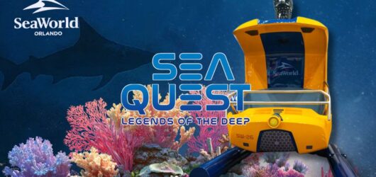 Promotional graphic poster for SEAQuest: Legends of the Deep at SeaWorld Orlando, featuring the ride logo, the yellow submersible vehicle, coral reef elements, and a shark silhouette.