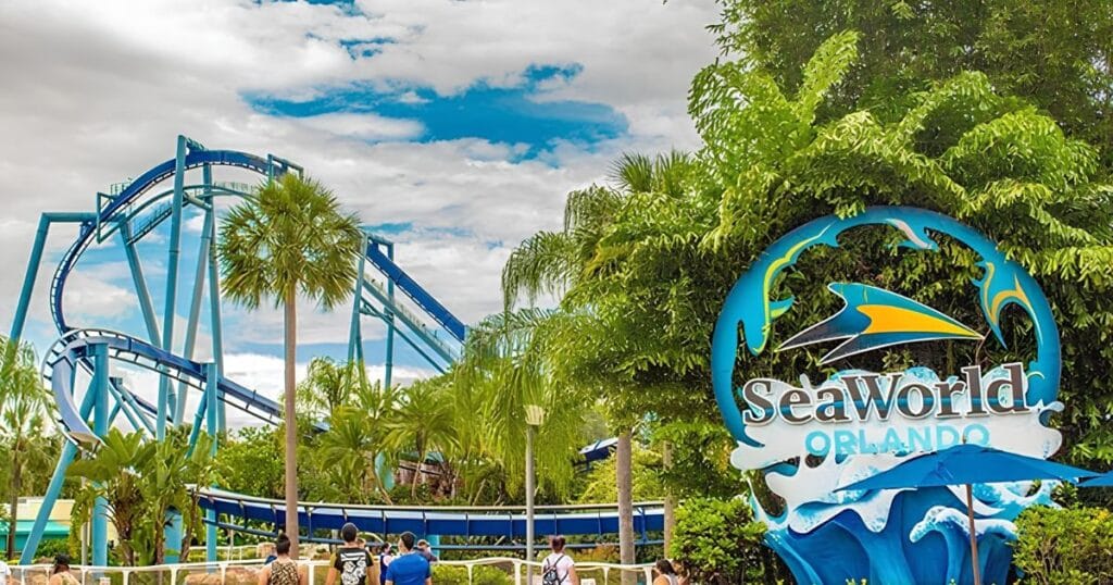 SeaWorld Orlando entrance sign with Mako roller coaster in the background