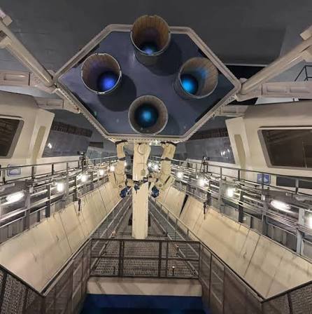 Space Mountain interior roller coaster track and structural steel inside the dark dome