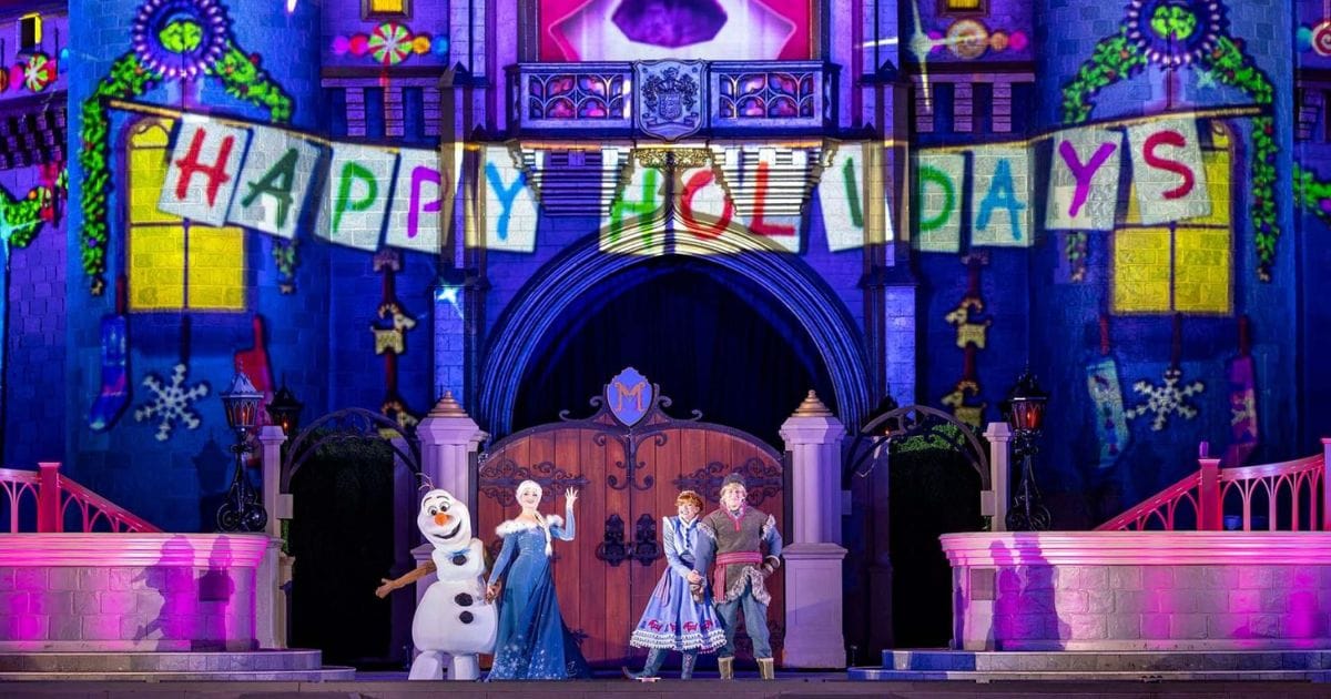 The Ultimate Guide to Mickey's Very Merry Christmas Party 2026 6 Frozen Holiday Surprise lighting display on Cinderella Castle