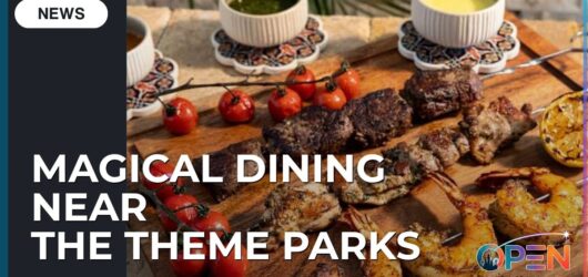 Theme Park Foodie Guide: Magical Dining Near Orlando’s Top Attractions 4 Platter of gourmet grilled steak, chicken, and shrimp skewers with roasted tomatoes and dipping sauces, overlaid with text reading Magical Dining Near The Theme