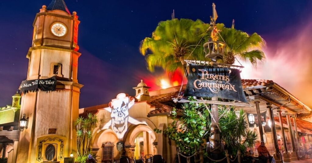 Pirates of the Caribbean: Magic Kingdom Ride Guide 2 Exterior facade of the Pirates of the Caribbean ride in Adventureland at Magic Kingdom during evening illumination.