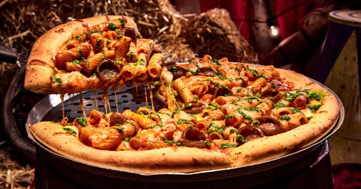 Top Food & Merch at Halloween Horror Nights 2026 — Universal Studios Florida 3 Rigatoni Ritual Pie served at Louie's Italian Restaurant for Halloween Horror Nights 2026