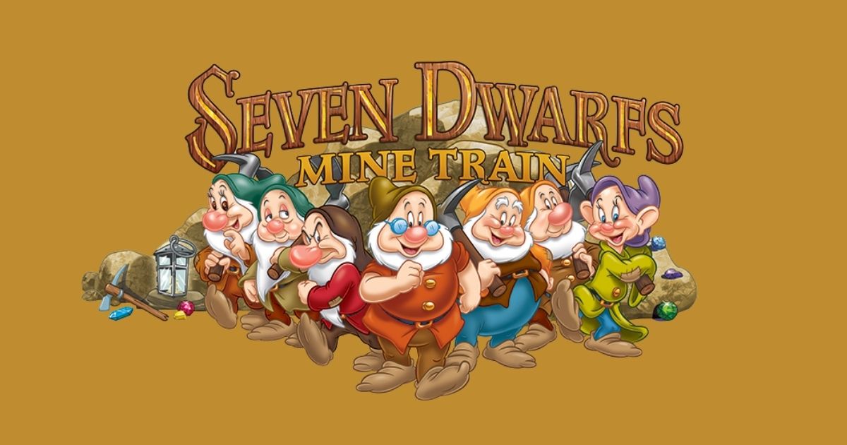 Seven Dwarfs Mine Train: Magic Kingdom Ride Guide 1 Official Seven Dwarfs Mine Train logo featuring all seven dwarfs standing together in front of a rustic background.