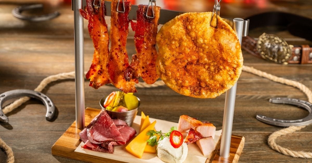 Charcuterie plate featuring cured meats and cheeses at The Diamond Horseshoe