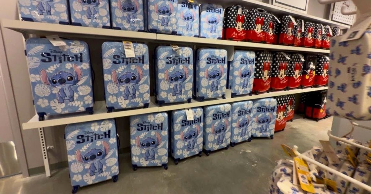 Inside the New Primark at Orlando Vineland Premium Outlets: Discount Disney Merchandise Guide 4 Stitch and Minnie Mouse hard-shell luggage sets on display at the Orlando Vineland Primark store.