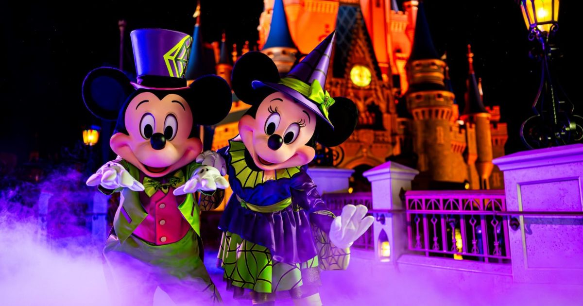 Mickey Mouse and Minnie Mouse in their exclusive 2026 Halloween outfits at Town Square Theater.