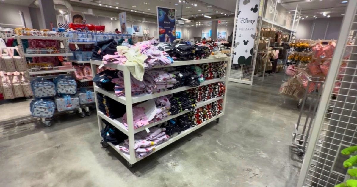 Inside the New Primark at Orlando Vineland Premium Outlets: Discount Disney Merchandise Guide 2 A fully stocked rack of discounted Disney graphic t-shirts and apparel at the Primark store in Orlando Vineland Premium Outlets.