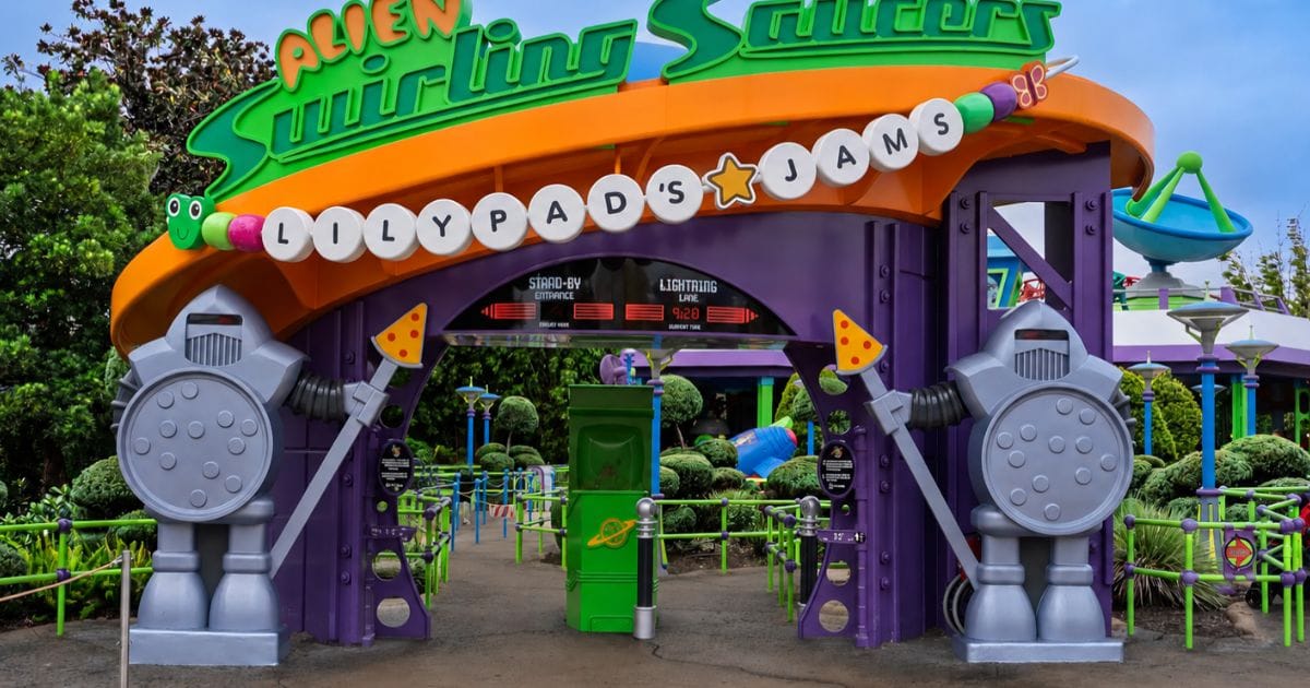 Alien Swirling Saucers entrance sign updated with Lilypad's Jams overlay at Disney's Hollywood Studios