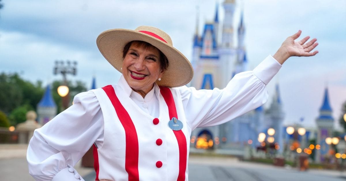 Carol seated at the piano outside Casey's Corner on Main Street U.S.A.