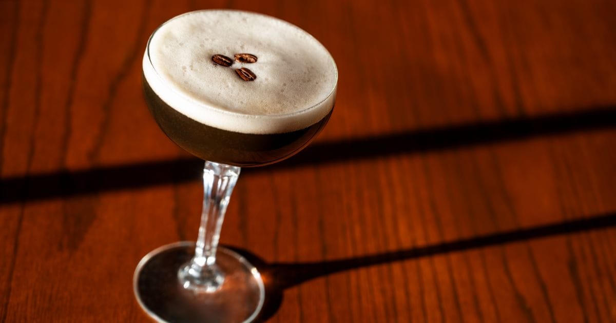 Sophisticated after-dinner cocktail made with rich coffee liqueur, spirits, and silky froth topped with classic espresso bean garnishes