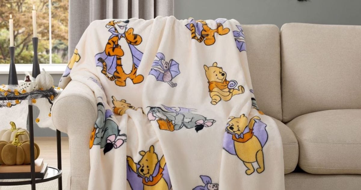 Jay Franco Winnie the Pooh Halloween silk touch throw blanket with Pooh and Piglet in Halloween costumes