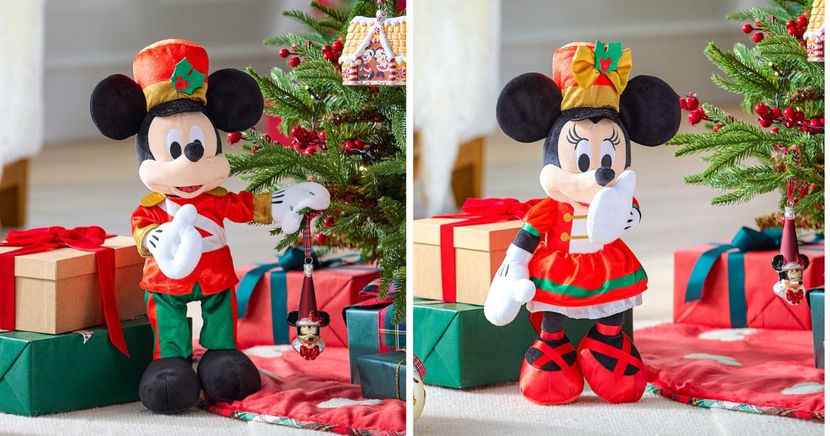 Side-by-side view of Mickey Mouse and Minnie Mouse dressed as holiday nutcracker soldier plush figures beside Christmas trees.