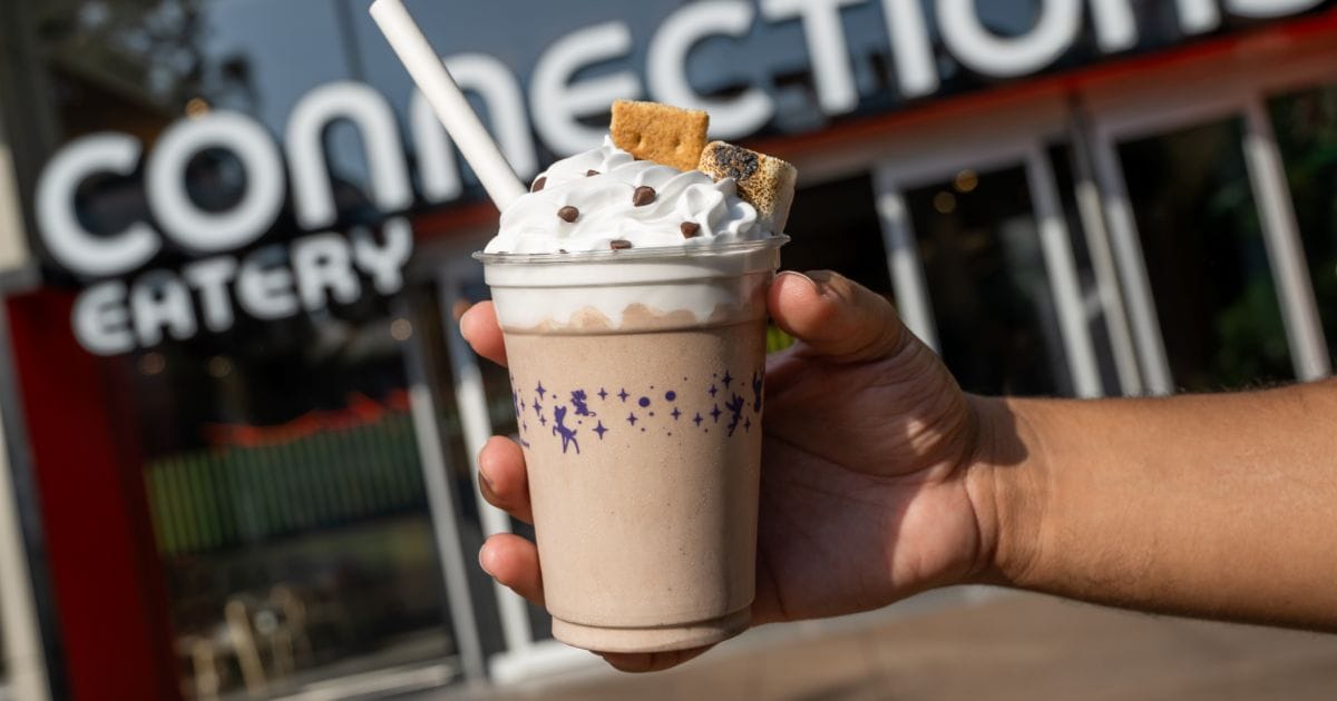 Decadent chocolate s'mores gelato shake from EPCOT's Connections Eatery loaded with whipped cream, toasted marshmallow, and graham crackers