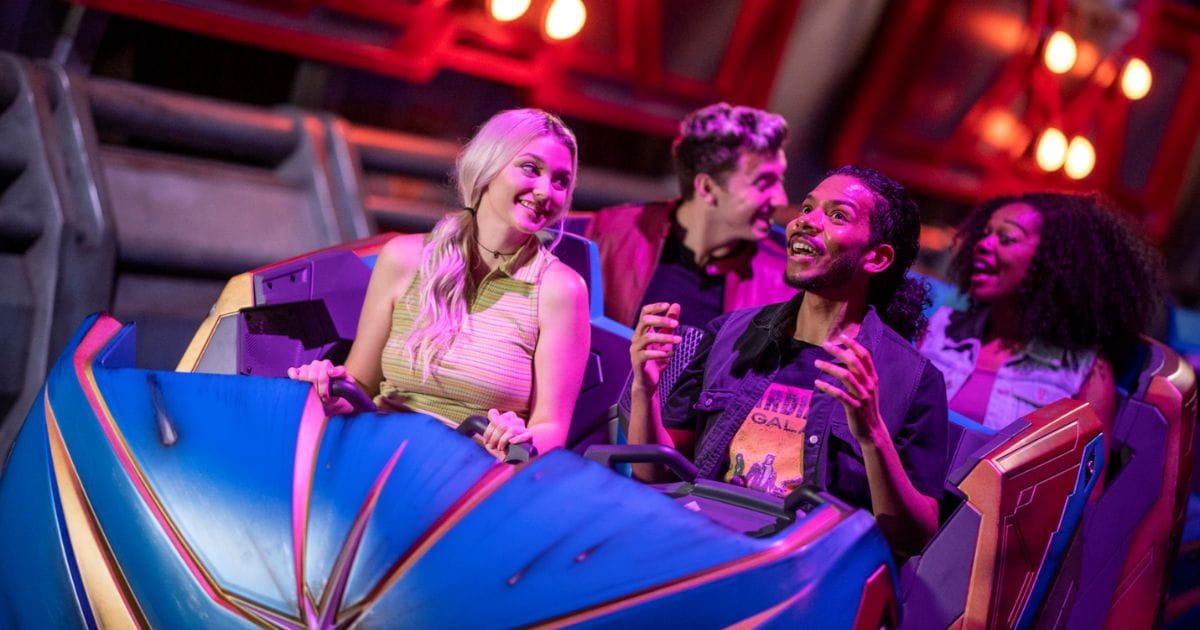 A Starjumper ride vehicle rotating on the track inside Guardians of the Galaxy: Cosmic Rewind.