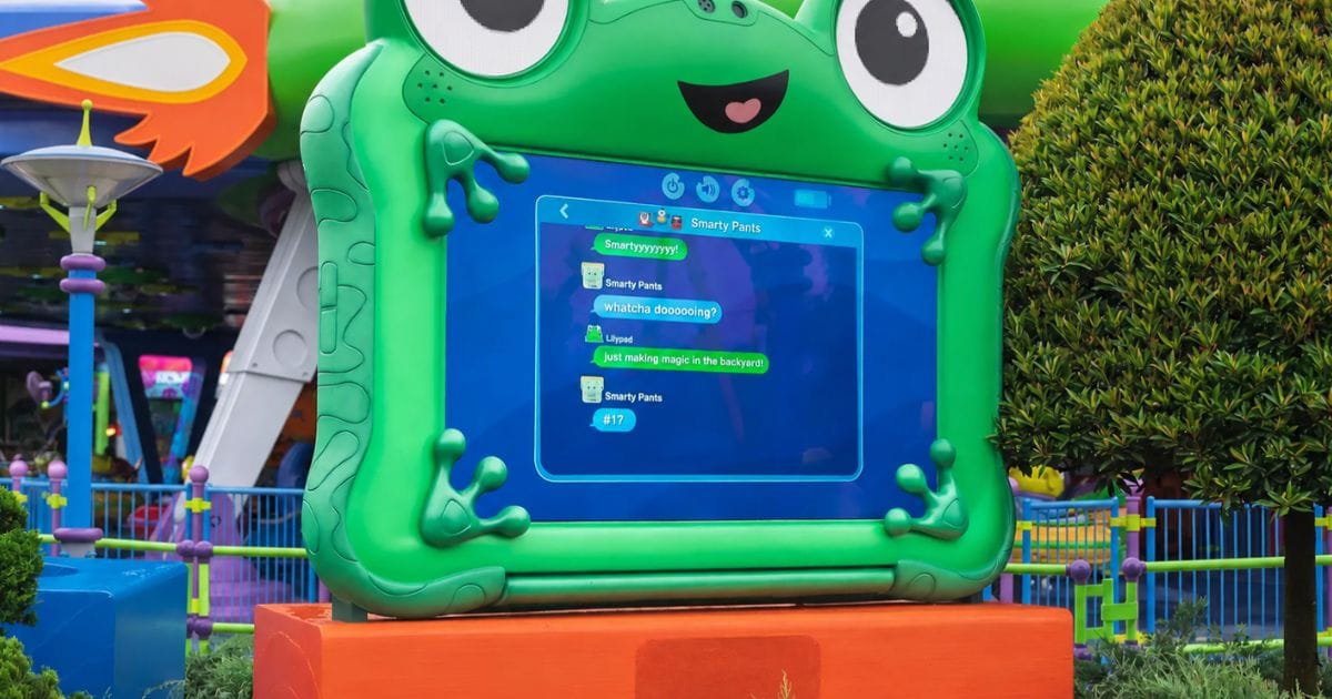 The Lilypad frog screen displays an on-screen messaging application showing a chat between characters Lilypad and Smarty Pants referencing backyard play in Disney's Hollywood Studios