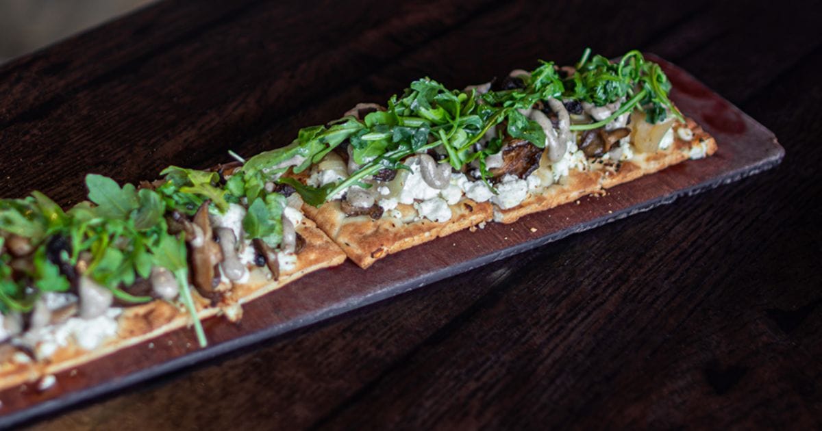 Forest Mushroom Flatbread at Toothsome Chocolate Emporium topped with goat cheese and truffle oil