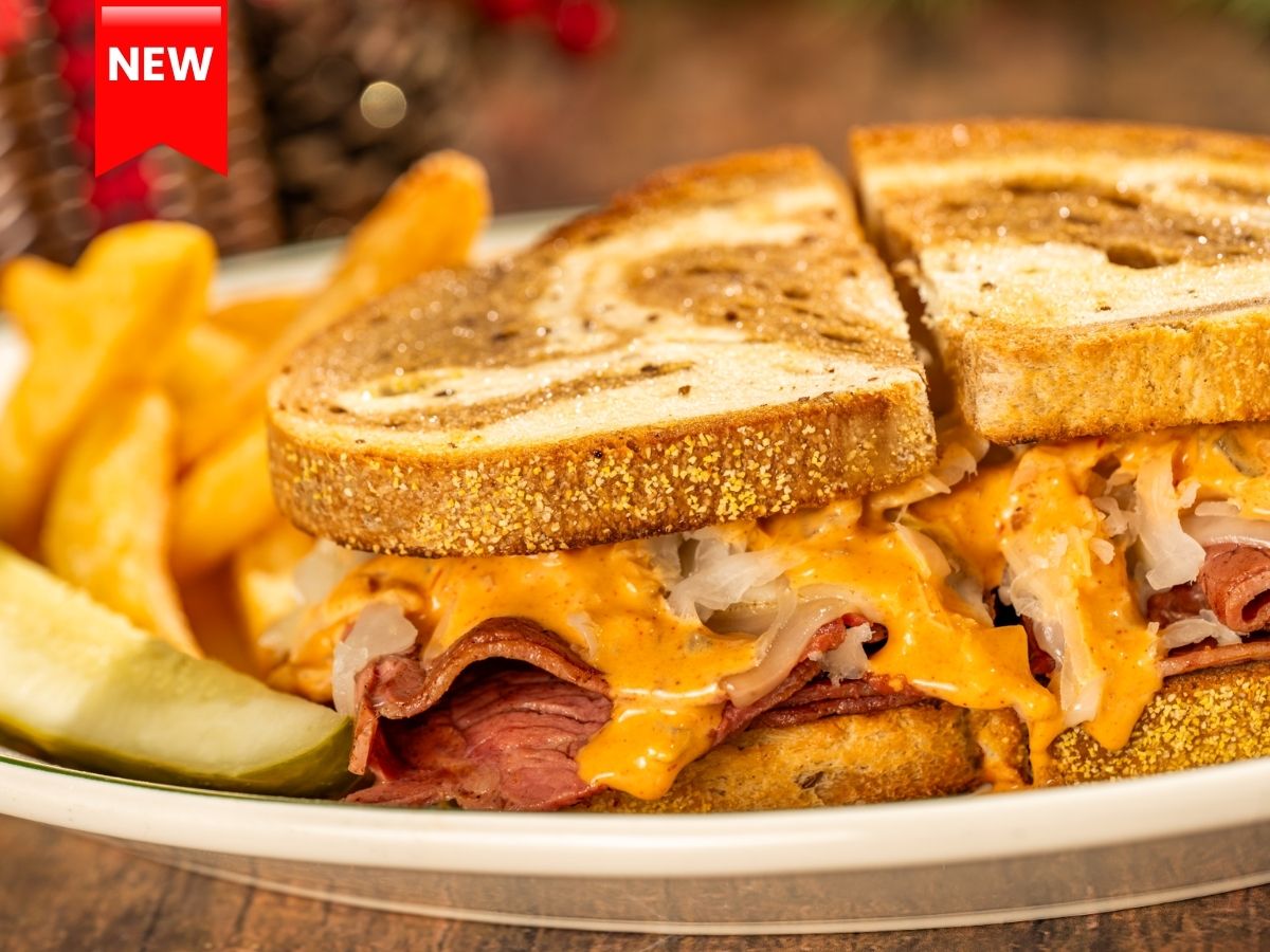 The Classic Reuben Sandwich stacked on rye bread and served at The Plaza Restaurant