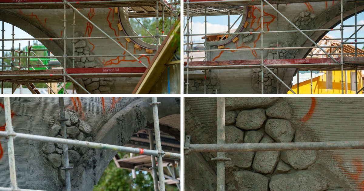Spray-painted outlines and stucco detailing on the Pueblo Esperanza archway