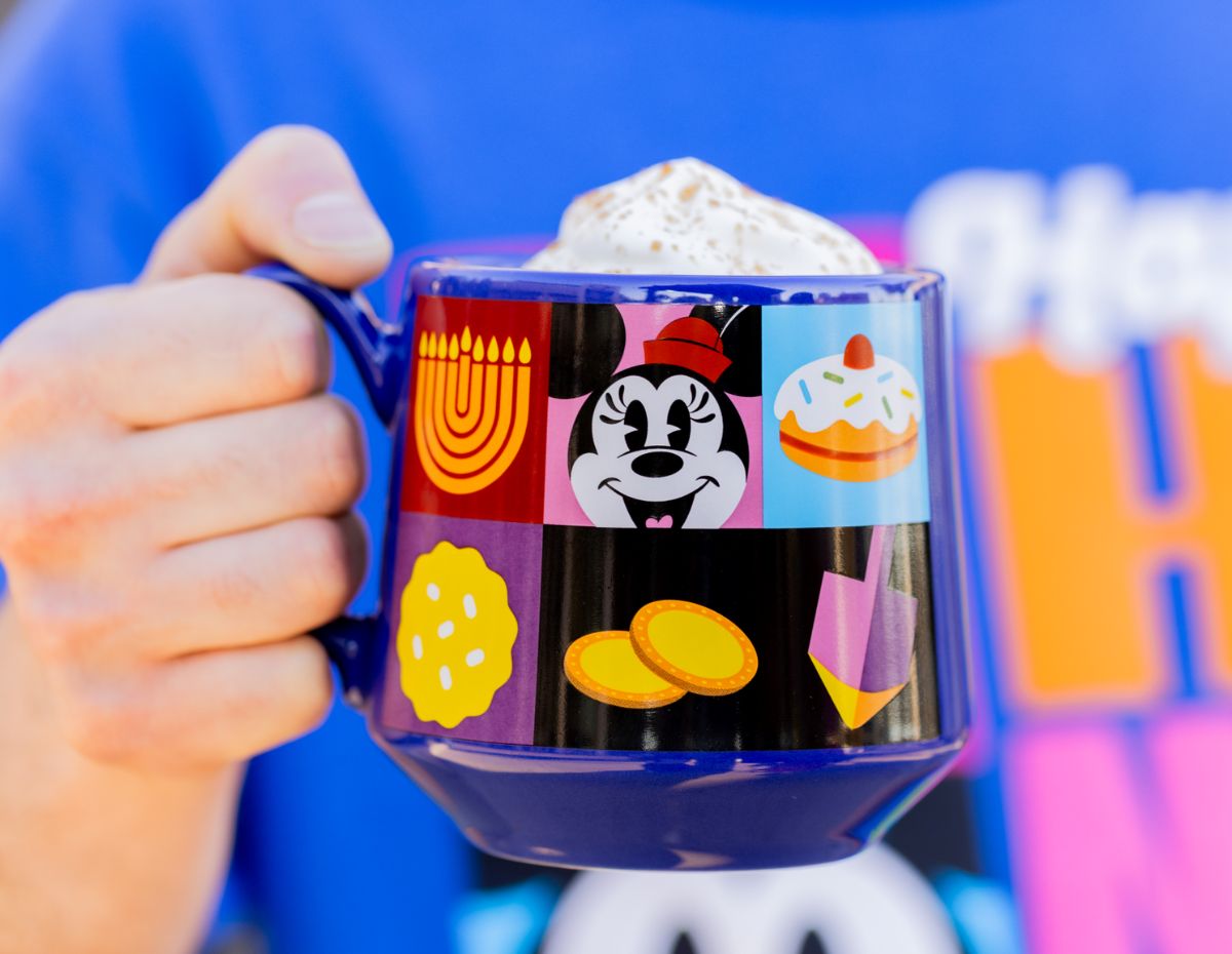 The Disney Hanukkah coffee mug featuring blue and gold designs