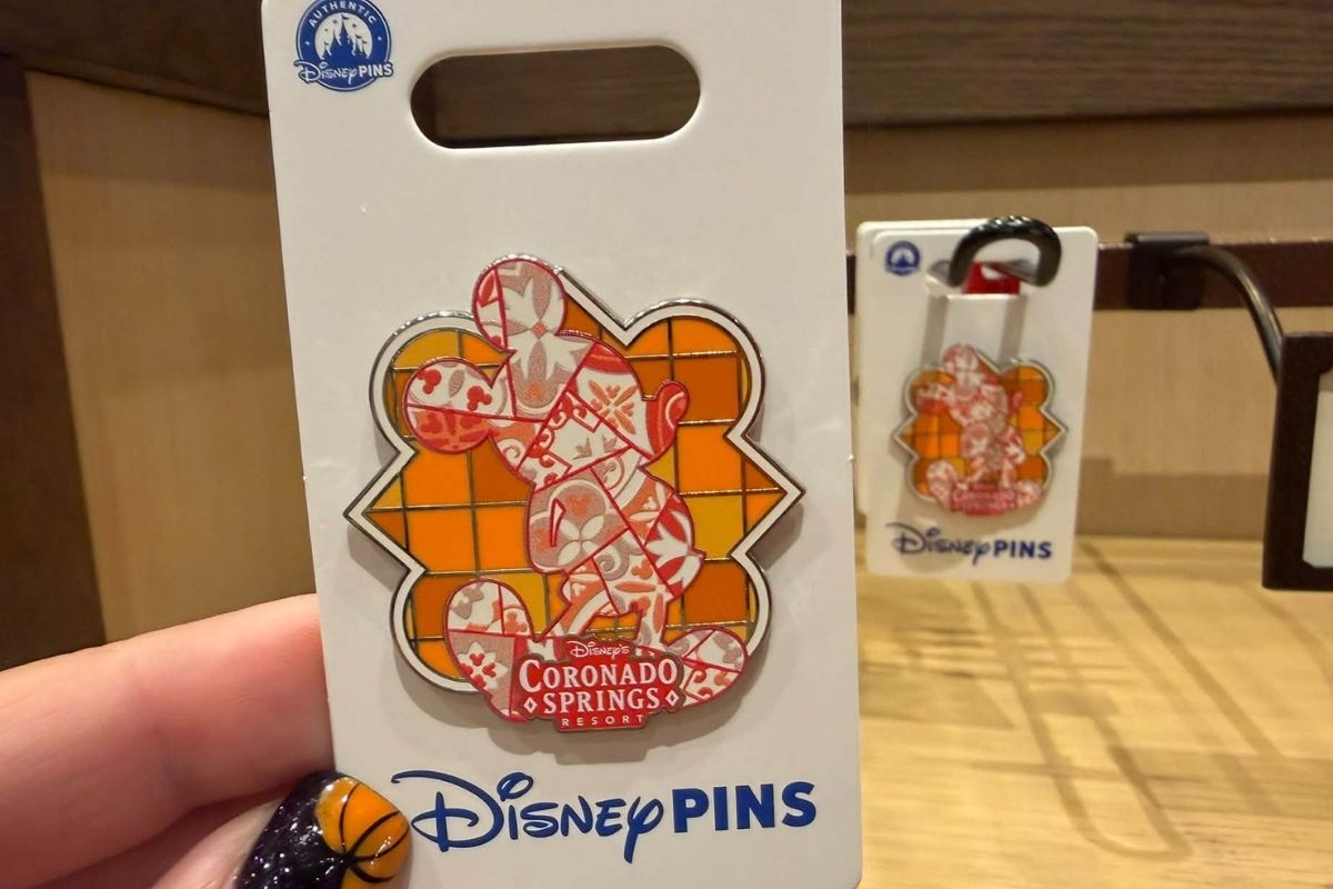 A stained-glass style Mickey Mouse mosaic pin for Coronado Springs Resort