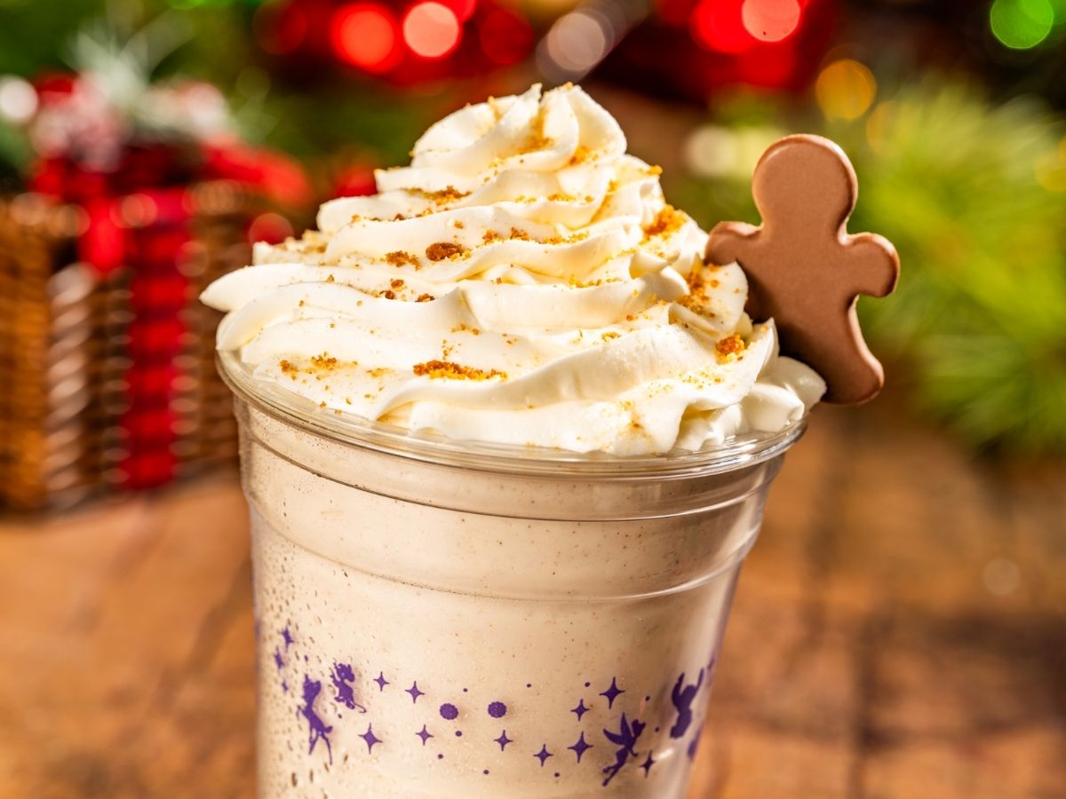 A topped Gingerbread Milkshake served in a clear cup at Plaza Ice Cream Parlor