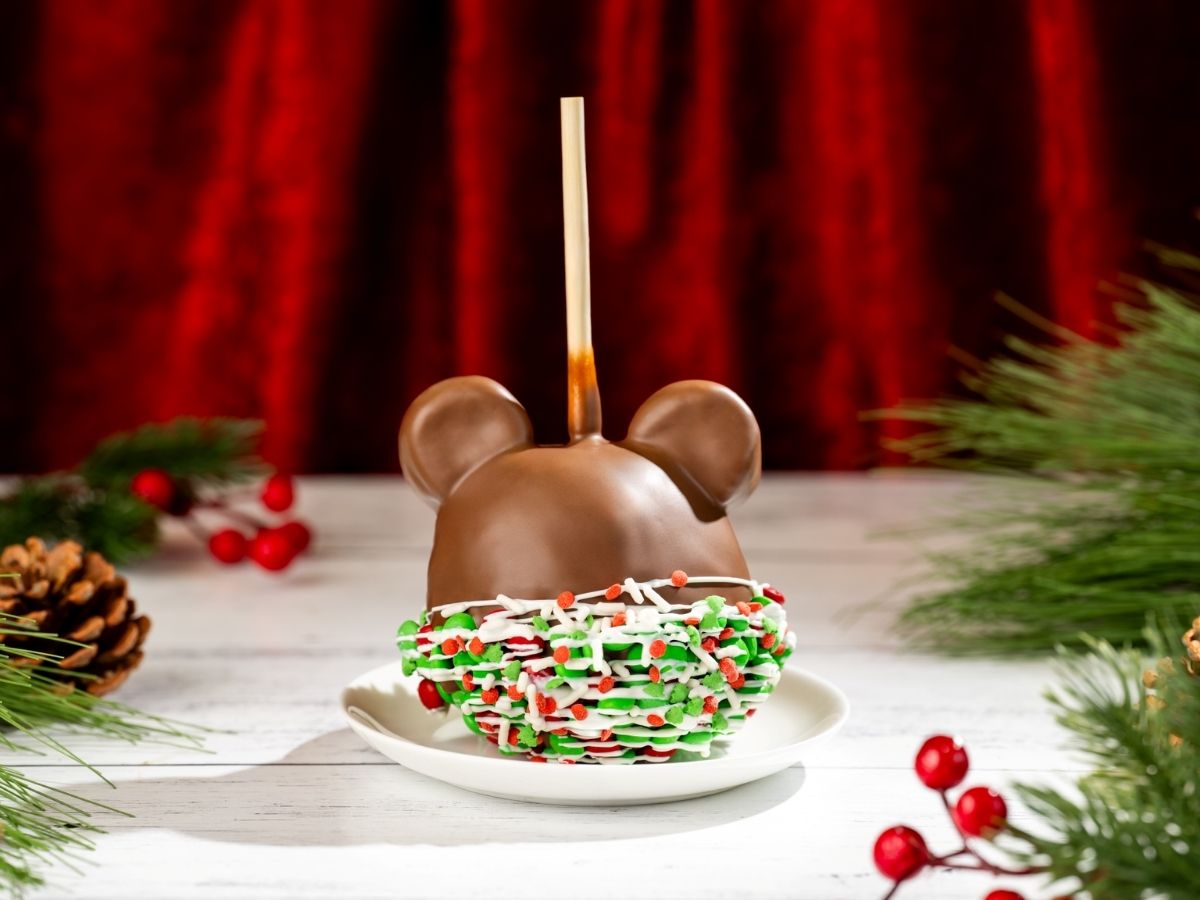 A standard Mickey Holiday Caramel Apple with sugar coating