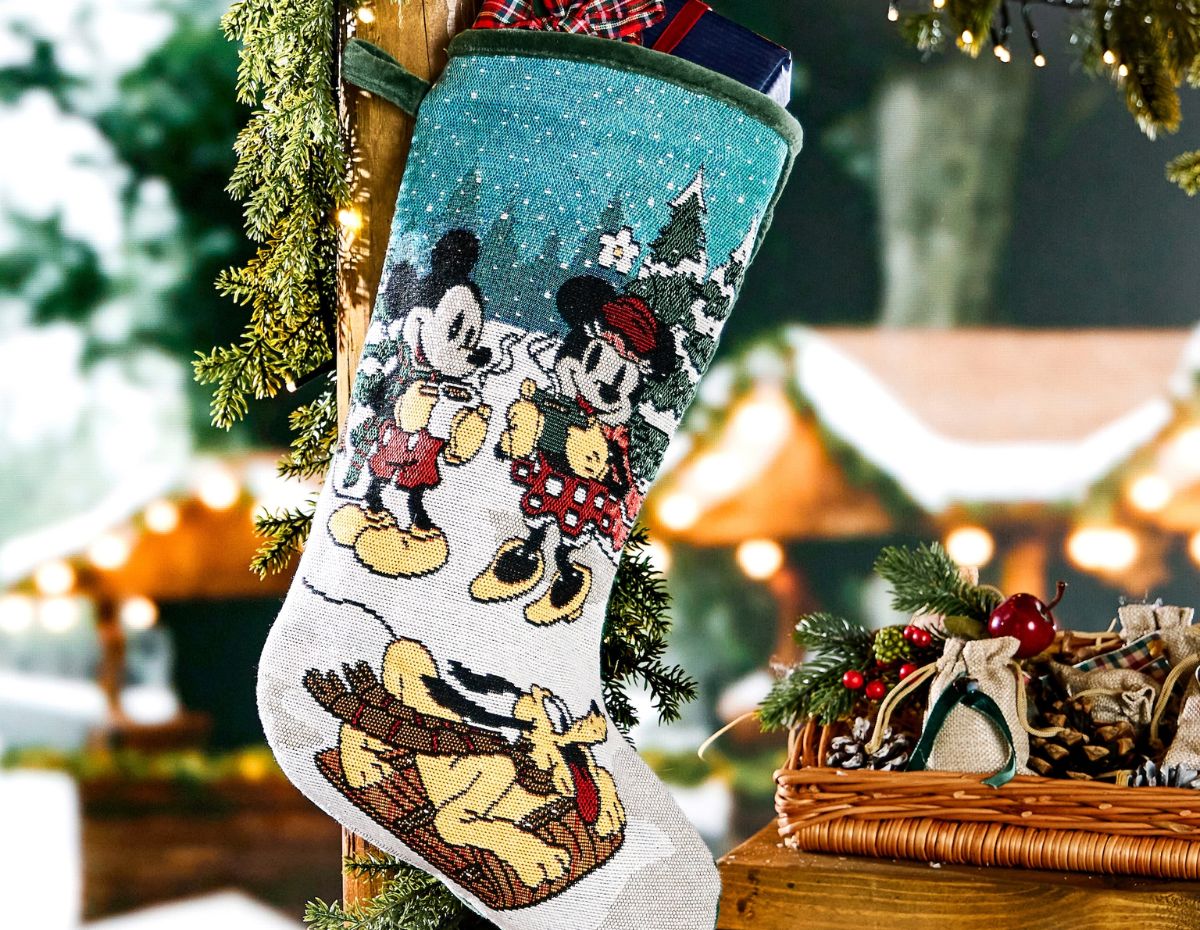 The Mickey Mouse and Friends Christmas Stocking hanging on a hook