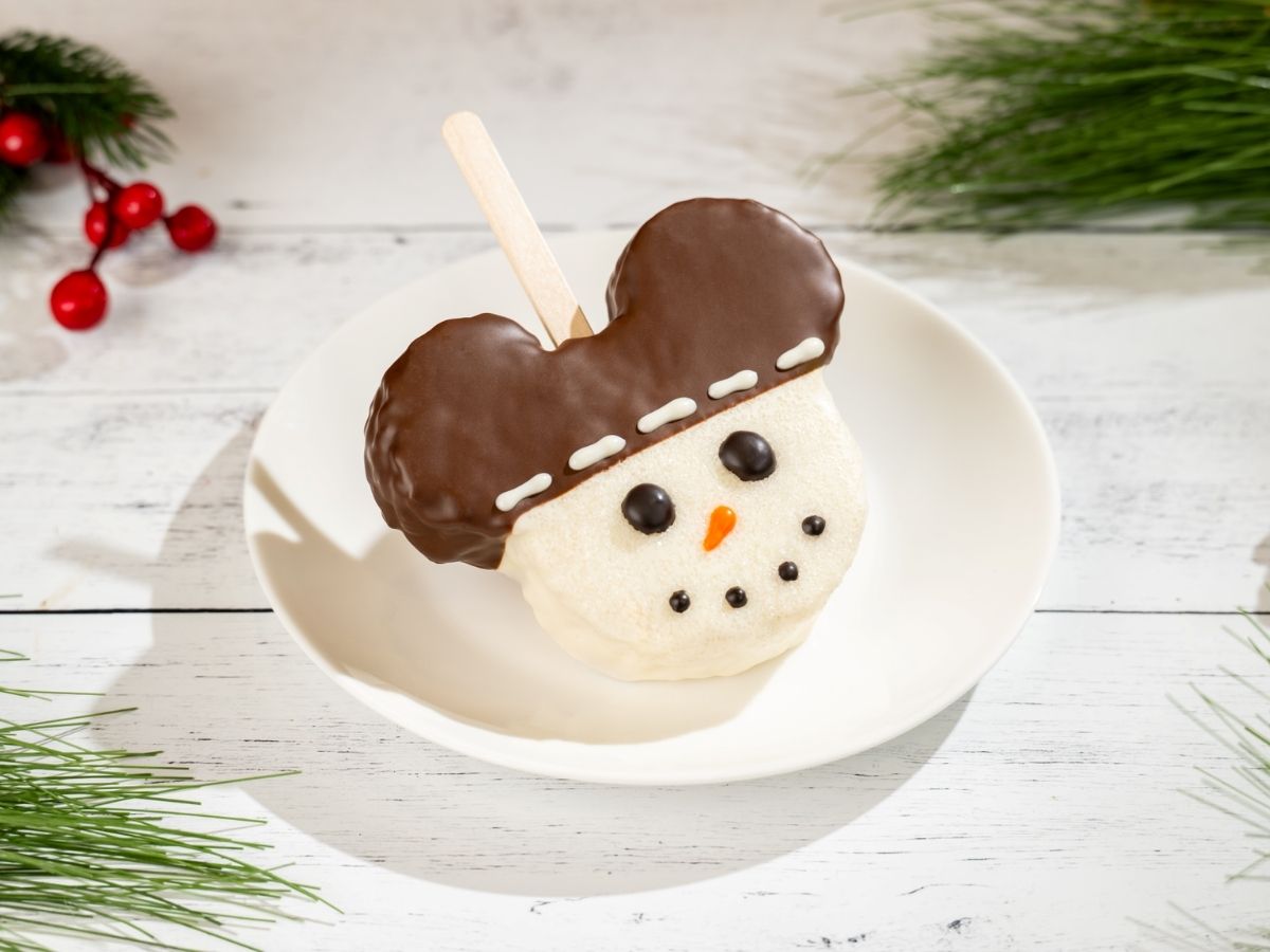 Mickey Snowman Cereal Treat decorated with white icing and a top hat