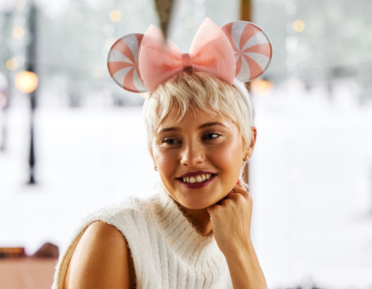 The Minnie Mouse Holiday Ear Headband with Bow Pink Peppermint