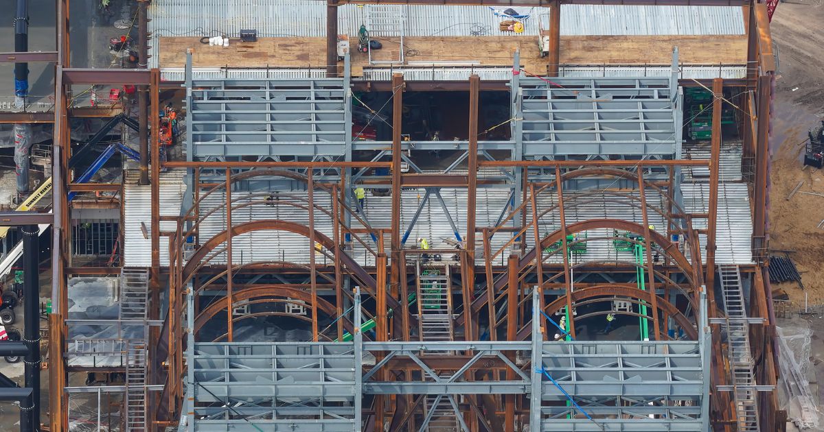 Steel framework and Vekoma track installation inside the Monsters, Inc. Door Vault Coaster Gravity Building at Disney's Hollywood Studios