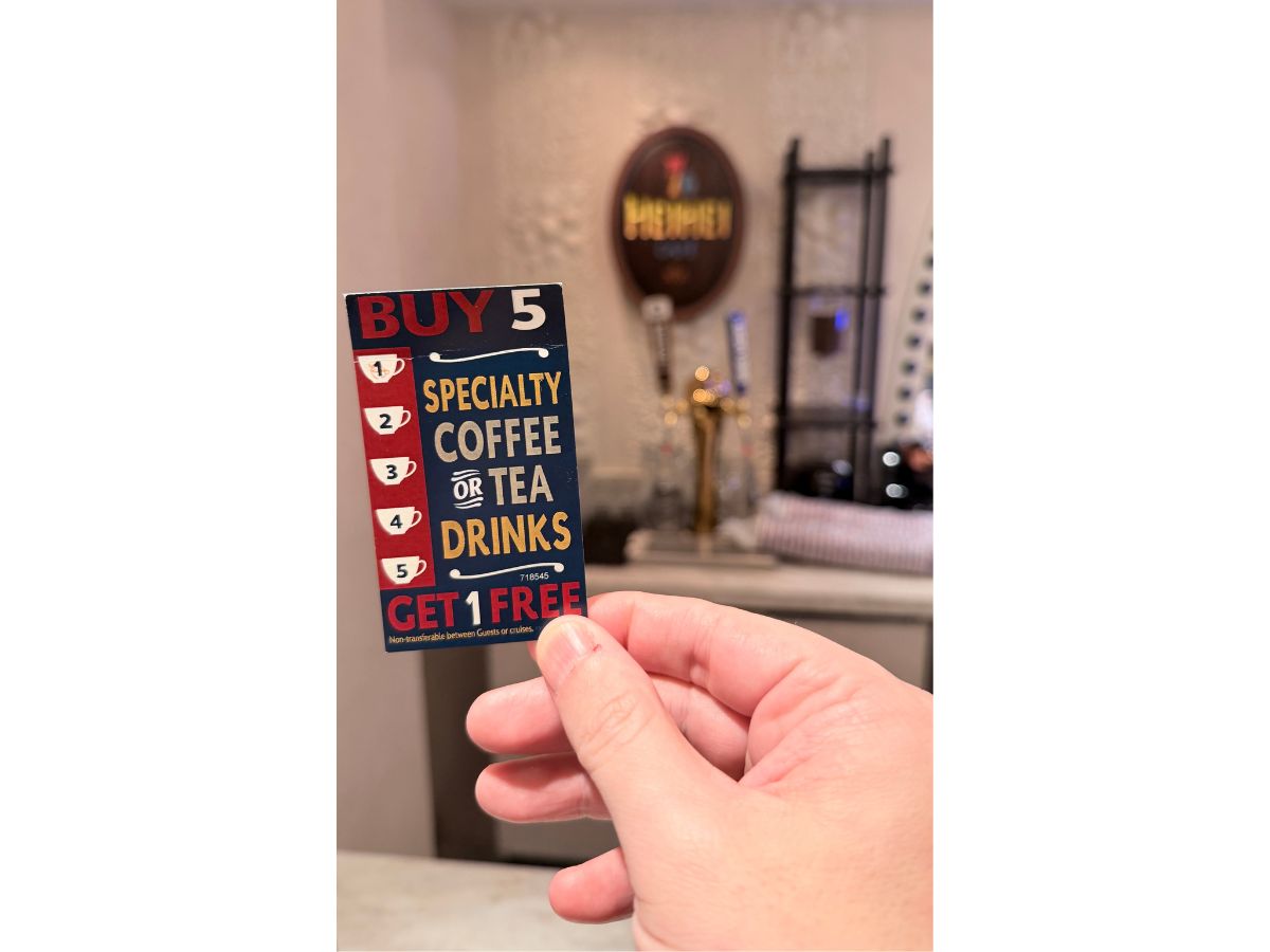 Reverse side of the new Disney Cruise Line specialty coffee loyalty punch card detailing terms, conditions, and redemption guidelines