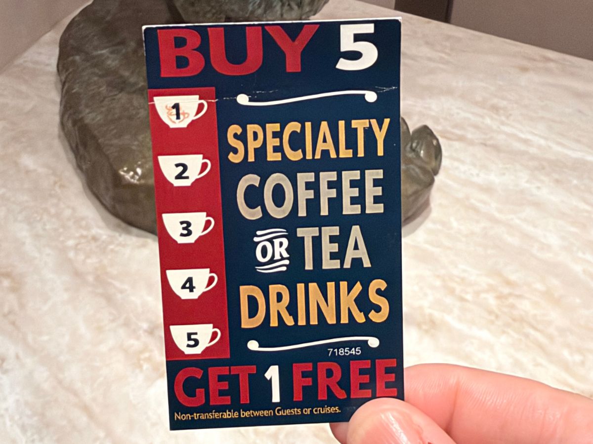 Front view of the redesigned Disney Cruise Line coffee reward card showing five punch circles and promotional branding for specialty beverages