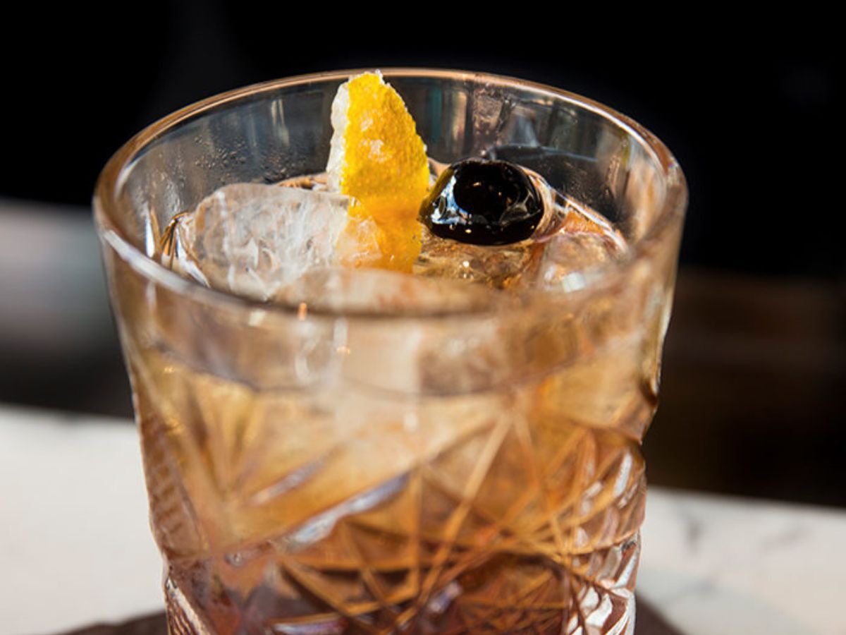 An Old Chocolate Fashioned cocktail served over ice