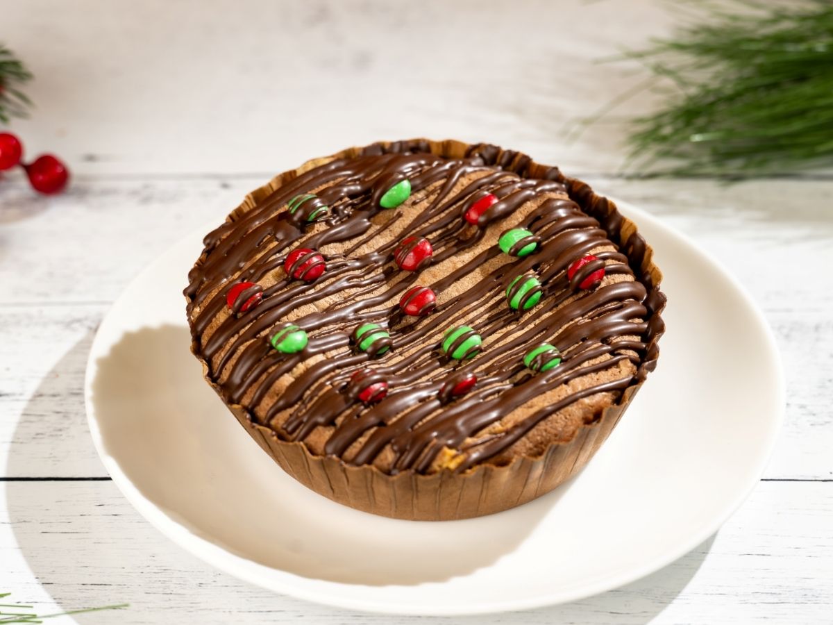 Peppermint Brownie Pie topped with crushed peppermint candy