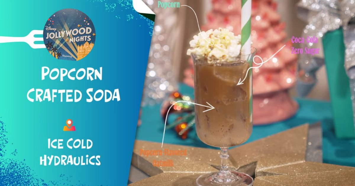 A cup of Coca-Cola Zero Sugar mixed with oat milk and topped with fresh popcorn