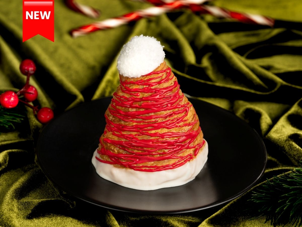 Santa Hat Croissant decorated with red coloring and white trim