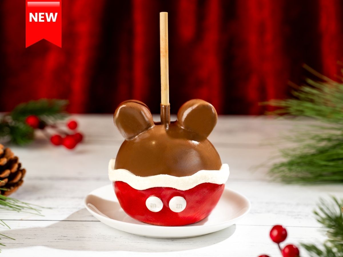 Santa Mickey Caramel Apple coated in chocolate and M&Ms Milk Chocolate Candies