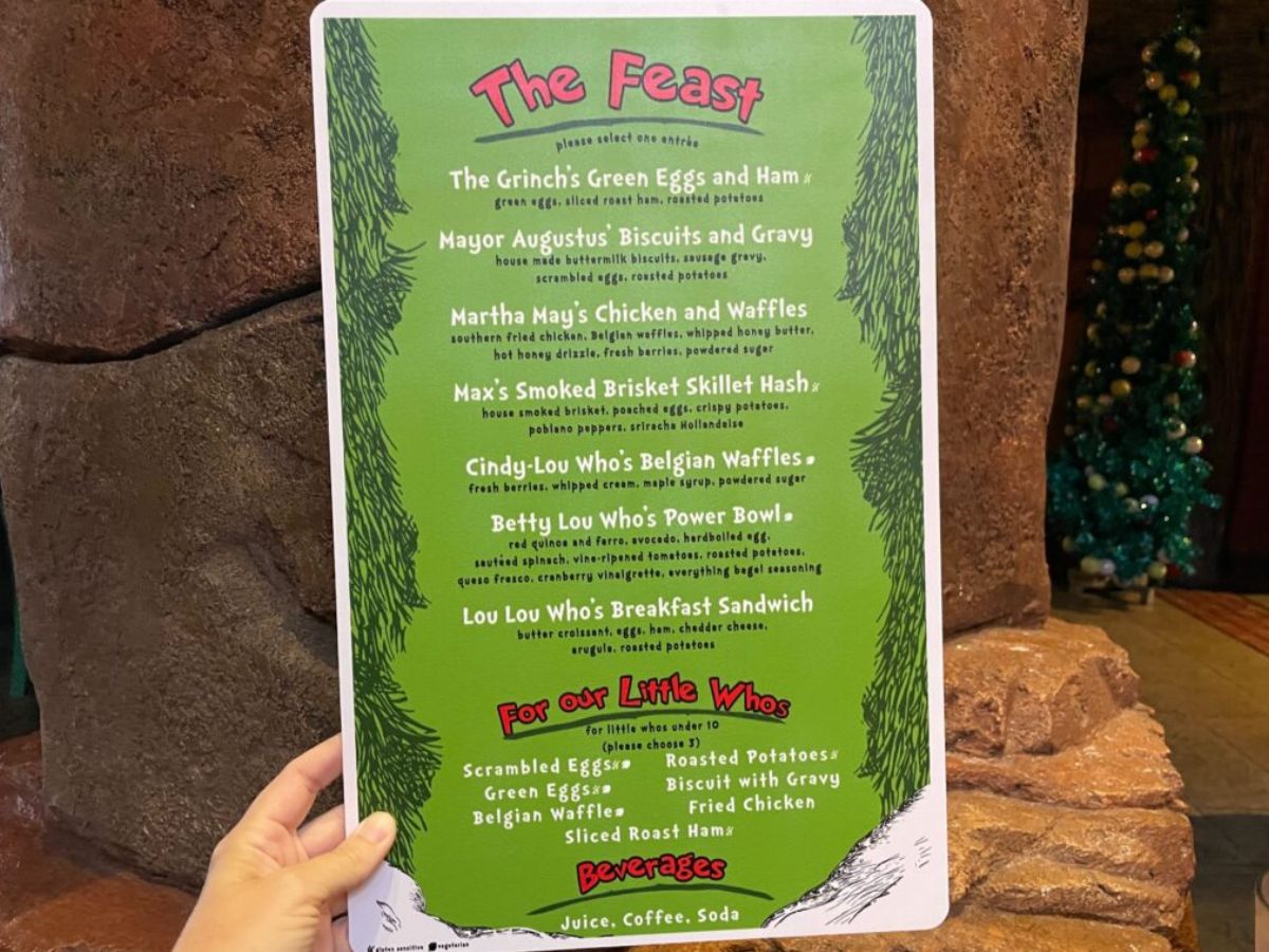 A digital menu board showing breakfast options for the Grinch character breakfast
