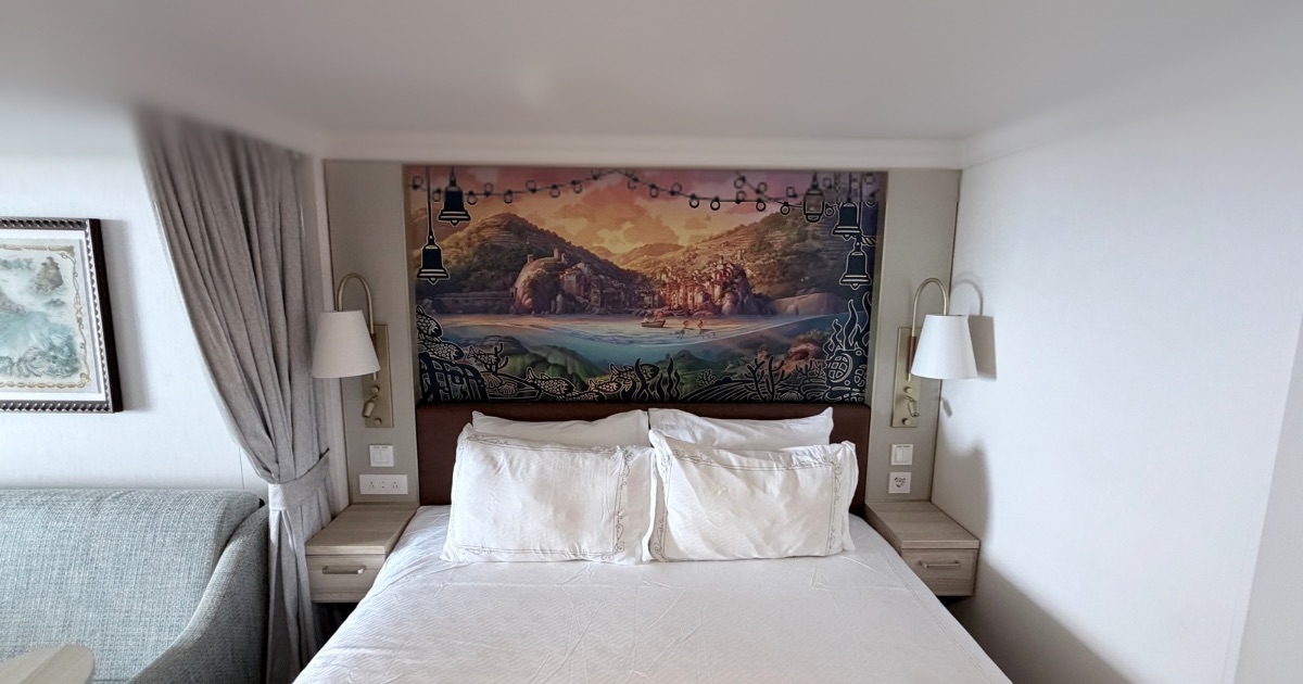 View of the bed setup inside Stateroom 10550 on the Disney Treasure