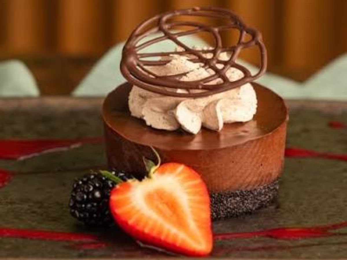 A slice of plant-based vegan dark chocolate mousse cake