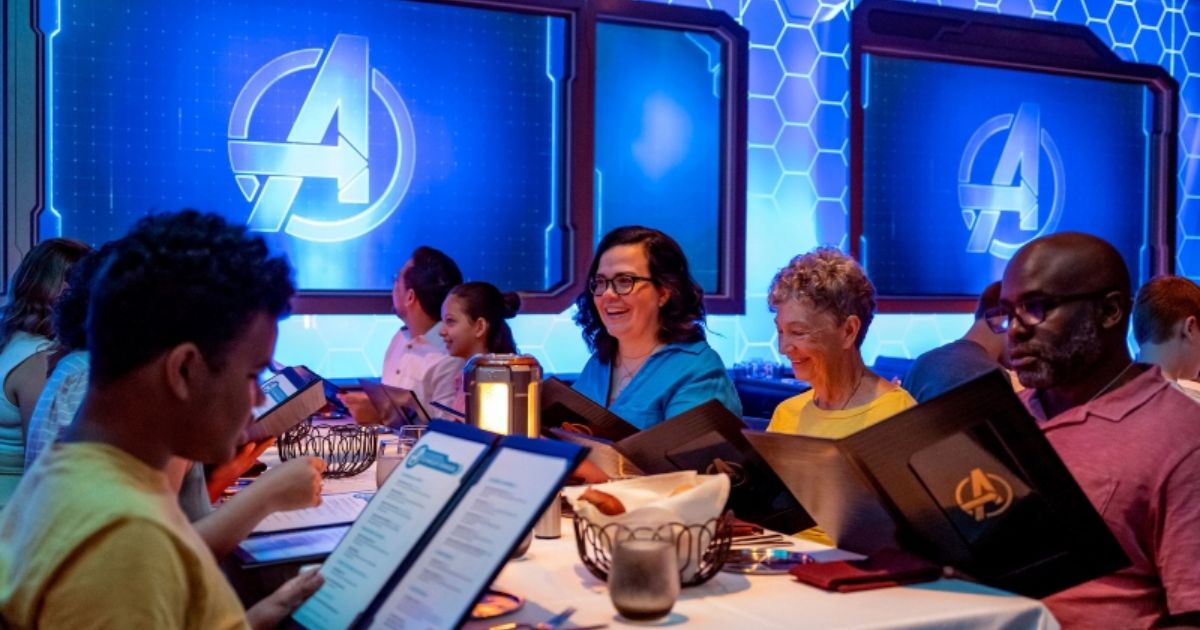 Dining room interior with interactive video screens at Worlds of Marvel